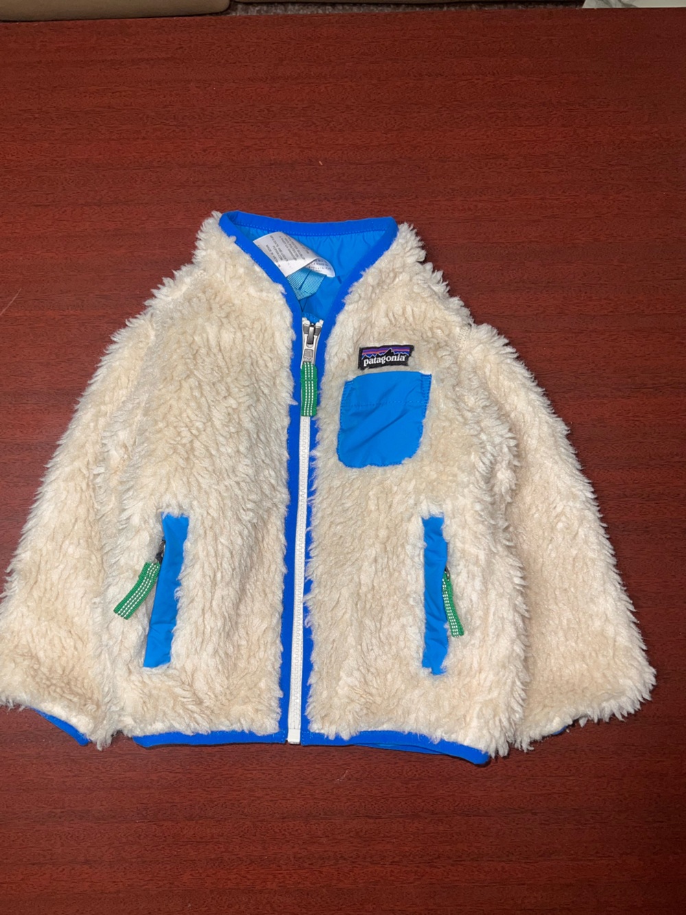 Patagonia Cream Fuzzy Jacket with Bright Blue Trim